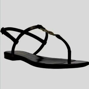 Saint Laurent
Black Patent
Leather slides